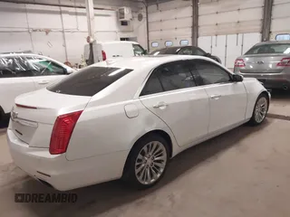 2016 Cadillac CTS Luxury Collection AWD with VIN 1G6AX5SS6G0125285, listed as a IAAI auction lot 42137355 with 110,299 mi miles and . Bid and sale history available at DreamBid. Image 4.