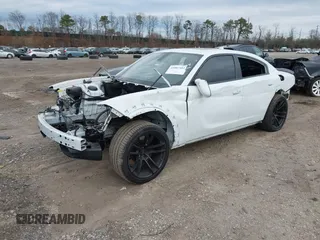 2021 Dodge Charger Scat Pack Widebody with VIN 2C3CDXGJ8MH584470, listed as a IAAI auction lot 41887401 with 18,989 mi miles. Bid and sale history available at carsss.com. Image 2.