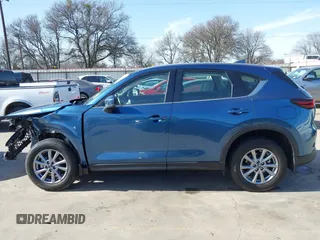 2023 Mazda CX-5 2.5 S with VIN JM3KFBAM4P0281628, listed as a IAAI auction lot 41724158 with 6,013 mi miles. Bid and sale history available at carsss.com. Image 15.