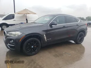 2015 BMW X6 sDrive35i with VIN 5UXKU0C59F0F91881, listed as a Copart auction lot 69878554 with 120,065 mi miles and Salvage Title. Bid and sale history available at carsss.com. Image 1.