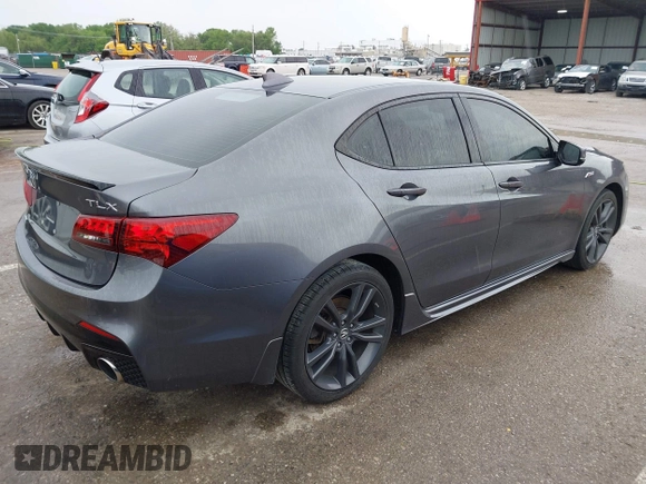 2019 Acura TLX w/A-Spec Pkg z VIN 19UUB2F61KA000932, wystawiony jako IAAI lot #42164064 z przebiegiem 79 080 mil mil oraz . Historia ofert i sprzedaży dostępna na DreamBid. Obrazek 4.