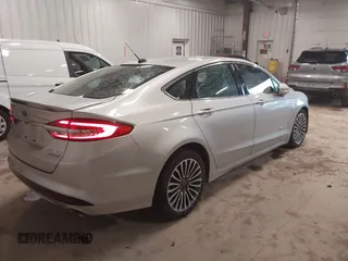 2018 Ford Fusion Titanium with VIN 3FA6P0RU9JR131818, listed as a IAAI auction lot 42442448 with 191,757 mi miles and . Bid and sale history available at DreamBid. Image 4.