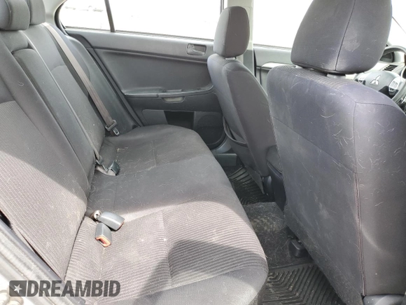 2014 Mitsubishi Lancer SE z VIN JA32V2FW3EU602908, wystawiony jako Copart lot #60148705 z przebiegiem 188 938 mil mil oraz Szkoda całkowita • Salvage title. Historia ofert i sprzedaży dostępna na DreamBid. Obrazek 10.