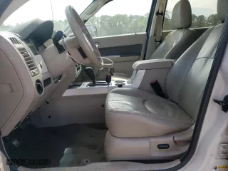 2011 Mercury Mariner Premier with VIN 4M2CN8HG1BKJ00611, listed as a Copart auction lot 74823504 with 173,854 mi miles and Salvage Title. Bid and sale history available at carsss.com. Image 7.