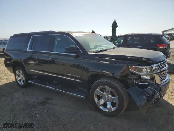 2017 Chevrolet Suburban LT with VIN 1GNSCHKC3HR331854, listed as a Copart auction lot 50998945 with 138,158 mi miles and Salvage Title. Bid and sale history available at carsss.com. Image 4.