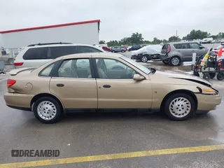 2002 Saturn LS z VIN 1G8JS54F02Y543678, wystawiony jako IAAI lot #42213978 z przebiegiem 132 755 mil mil oraz . Historia ofert i sprzedaży dostępna na DreamBid. Obrazek 13.