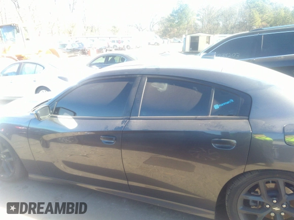 2023 Dodge Charger R/T with VIN 2C3CDXCT7PH576212, listed as a IAAI auction lot 41285793 with 37,471 mi miles and . Bid and sale history available at DreamBid. Image 14.