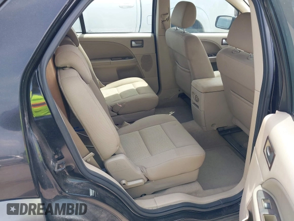 2005 Ford Freestyle SE z VIN 1FMZK01155GA31022, wystawiony jako IAAI lot #42042252 z przebiegiem 138 615 mil mil oraz . Historia ofert i sprzedaży dostępna na DreamBid. Obrazek 8.