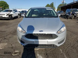 2018 Ford Focus SE z VIN 1FADP3F26JL278091, wystawiony jako Copart lot #63879875 z przebiegiem 81 984 mil mil oraz Czysty tytuł • Clean title. Historia ofert i sprzedaży dostępna na DreamBid. Obrazek 5.