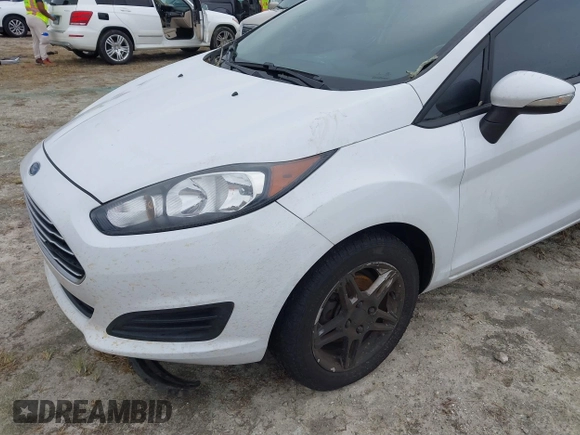 2017 Ford Fiesta SE with VIN 3FADP4BJXHM167605, listed as a IAAI auction lot 40510179 with 76,091 mi miles and . Bid and sale history available at DreamBid. Image 2.