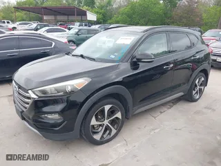 2017 Hyundai Tucson Value with VIN KM8J33A26HU362363, listed as a IAAI auction lot 41940376 with 127,986 mi miles. Bid and sale history available at carsss.com. Image 20.
