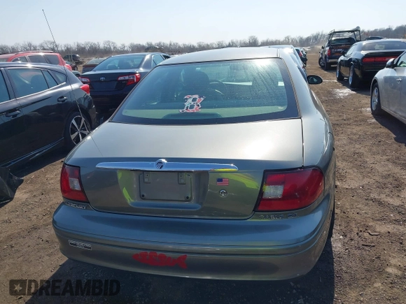 2003 Mercury Sable GS z VIN 1MEFM50243A619761, wystawiony jako IAAI lot #41790150 z przebiegiem 114 522 mil mil oraz . Historia ofert i sprzedaży dostępna na DreamBid. Obrazek 16.