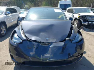 2024 Tesla Model Y Long Range with VIN 7SAYGDEE6RA225161, listed as a IAAI auction lot 42083140 with 28,289 mi miles and . Bid and sale history available at DreamBid. Image 12.