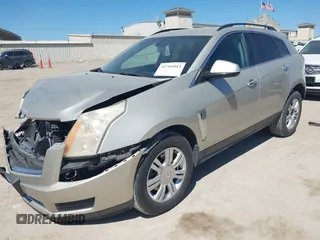 2013 Cadillac SRX z VIN 3GYFNAE33DS654844, wystawiony jako IAAI lot #41765013 z przebiegiem 117 616 mil mil oraz . Historia ofert i sprzedaży dostępna na DreamBid. Obrazek 2.