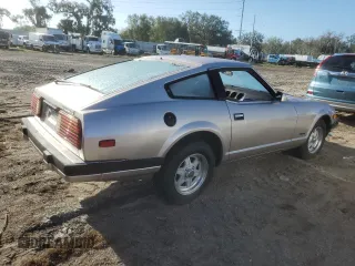 1983 Datsun 280ZX z VIN JN1HZ04S0DX560086, wystawiony jako Copart lot #79178604 z przebiegiem 183 309 mil mil oraz Szkody całkowita. Historia ofert i sprzedaży dostępna na DreamBid. Obrazek 3.