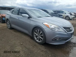 2015 Hyundai Azera z VIN KMHFG4JG7FA439963, wystawiony jako Copart lot #57679575 z przebiegiem 200 379 mil mil oraz Czysty tytuł • Clean title. Historia ofert i sprzedaży dostępna na DreamBid. Obrazek 4.