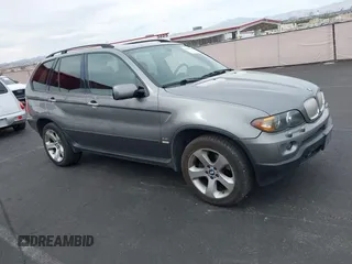 2004 BMW X5 4.4i with VIN 5UXFB53524LV08787, listed as a IAAI auction lot 41783233 with 143,027 mi miles. Bid and sale history available at carsss.com. Image 1.