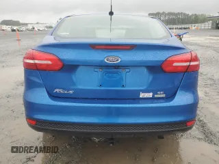 2018 Ford Focus SE z VIN 1FADP3FE6JL227653, wystawiony jako Copart lot #56827585 z przebiegiem Nie podano mil oraz Szkoda całkowita • Salvage title. Historia ofert i sprzedaży dostępna na DreamBid. Obrazek 6.