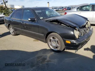 2001 Mercedes-Benz E-Class with VIN WDBJF70JX1B327997, listed as a Copart auction lot 87650175 with 268,045 mi miles and Salvage Title. Bid and sale history available at carsss.com. Image 4.