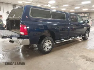 2015 Ram 2500 Tradesman z VIN 3C6TR5HTXFG605539, wystawiony jako IAAI lot #41833380 z przebiegiem 103 921 mil mil oraz . Historia ofert i sprzedaży dostępna na DreamBid. Obrazek 4.