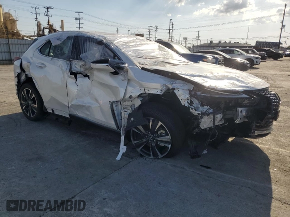 2025 Lexus UX with VIN JTHYBJAHXS2013108, listed as a Copart auction lot 45136895 with 1,350 mi miles and Salvage title. Bid and sale history available at DreamBid. Image 4.