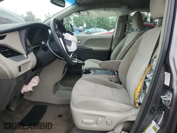 2015 Toyota Sienna LE AAS with VIN 5TDKK3DC3FS572405, listed as a Copart auction lot 58141975 with 146,820 mi miles and Salvage title. Bid and sale history available at DreamBid. Image 7.