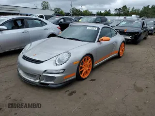 2007 Porsche 911 z VIN WP0AC29927S792403, wystawiony jako Copart lot #57745575 z przebiegiem 12 527 mil mil oraz Szkoda całkowita • Salvage title. Historia ofert i sprzedaży dostępna na DreamBid. Obrazek 1.