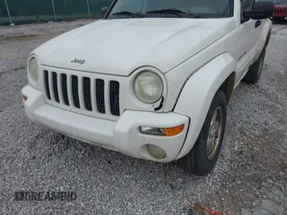2002 Jeep Liberty Limited with VIN 1J4GL58K32W246480, listed as a IAAI auction lot 41832097 with 300,097 mi miles and . Bid and sale history available at carsss.com. Image 6.