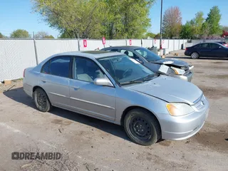 2001 Honda Civic EX with VIN 2HGES26771H512949, listed as a IAAI auction lot 42020043 with 299,833 mi miles. Bid and sale history available at carsss.com. Image 1.