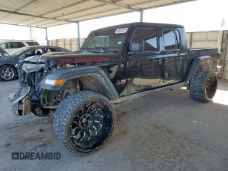 2020 Jeep Gladiator Rubicon with VIN 1C6JJTBG5LL116138, listed as a Copart auction lot 58061265 with 50,274 mi miles and Salvage title. Bid and sale history available at DreamBid. Image 1.
