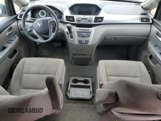 2014 Honda Odyssey LX z VIN 5FNRL5H21EB106600, wystawiony jako Copart lot #57875765 z przebiegiem 122 159 mil mil oraz Szkoda całkowita • Salvage title. Historia ofert i sprzedaży dostępna na DreamBid. Obrazek 8.