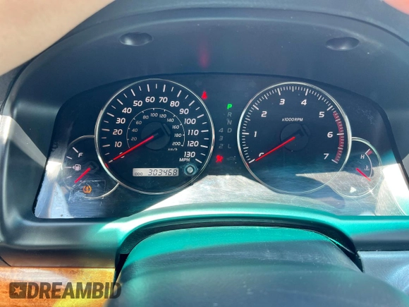 2004 Lexus GX 470 z VIN JTJBT20X940060144, wystawiony jako Copart lot #60893715 z przebiegiem 303 468 mil mil oraz Czysty tytuł • Clean title. Historia ofert i sprzedaży dostępna na DreamBid. Obrazek 8.