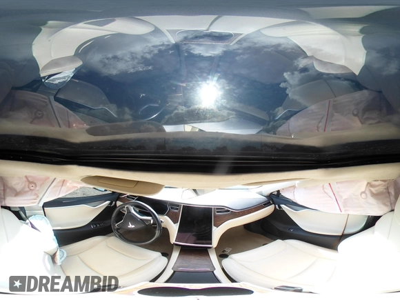 2017 Tesla Model S 100D with VIN 5YJSA1E28HF217489, listed as a IAAI auction lot 42128388 with Not provided miles and . Bid and sale history available at DreamBid. Image 19.