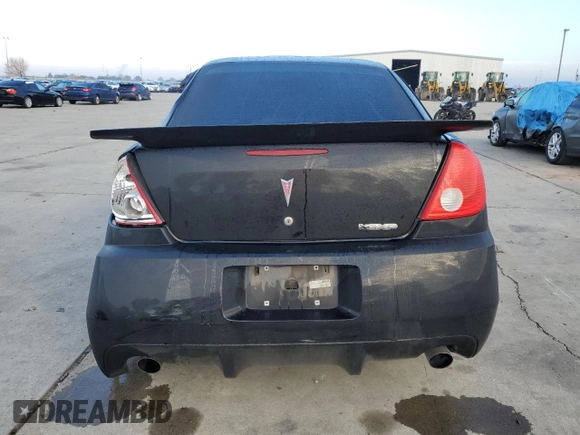 2008 Pontiac G6 GXP with VIN 1G2ZM577084181587, listed as a Copart auction lot 82910964 with 54,630 mi miles and Salvage Title. Bid and sale history available at DreamBid. Image 6.