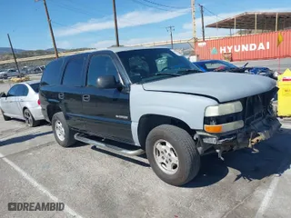 2001 Chevrolet Tahoe LT with VIN 1GNEC13T31R122882, listed as a IAAI auction lot 41999271 with 211,687 mi miles. Bid and sale history available at carsss.com. Image 1.