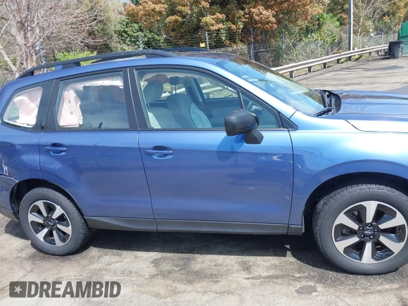 2018 Subaru Forester z VIN JF2SJABC9JH525596, wystawiony jako IAAI lot #41941424 z przebiegiem 32 622 mil mil oraz . Historia ofert i sprzedaży dostępna na DreamBid. Obrazek 13.