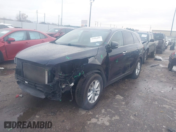 2020 Kia Sorento L with VIN 5XYPG4A31LG699874, listed as a IAAI auction lot 41296086 with 83,177 mi miles. Bid and sale history available at carsss.com. Image 2.