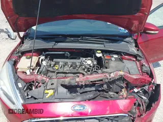 2017 Ford Focus SE z VIN 1FADP3F26HL305624, wystawiony jako IAAI lot #42411111 z przebiegiem 58 865 mil mil oraz . Historia ofert i sprzedaży dostępna na DreamBid. Obrazek 10.