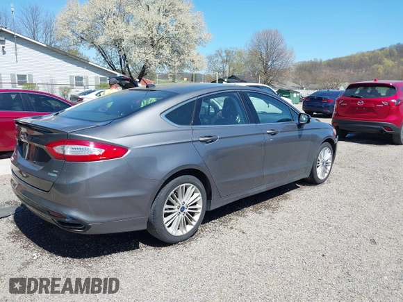 2014 Ford Fusion SE with VIN 3FA6P0H9XER319864, listed as a IAAI auction lot 42063072 with 151,526 mi miles. Bid and sale history available at carsss.com. Image 4.