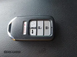 2020 Honda Civic Sedan Touring with VIN 19XFC1F91LE210390, listed as a IAAI auction lot 41766652 with 67,269 mi miles. Bid and sale history available at carsss.com. Image 11.
