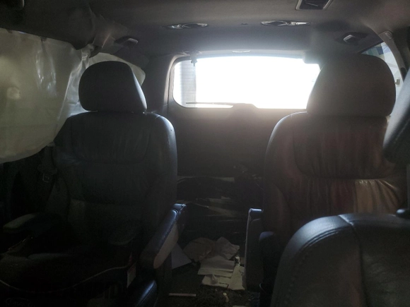2010 Honda Odyssey Touring with VIN 5FNRL3H91AB113770, listed as a Copart auction lot 61893115 with 155,776 mi miles and Salvage title. Bid and sale history available at DreamBid. Image 10.