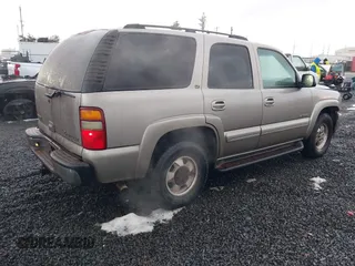 2003 Chevrolet Tahoe LS with VIN 1GNEK13T93J308334, listed as a IAAI auction lot 41582475 with 263,031 mi miles. Bid and sale history available at carsss.com. Image 4.
