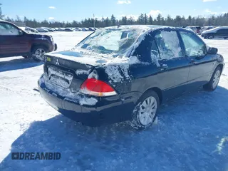 2006 Mitsubishi Lancer ES with VIN JA3AJ26E06U000385, listed as a IAAI auction lot 41587490 with 185,100 mi miles. Bid and sale history available at carsss.com. Image 4.