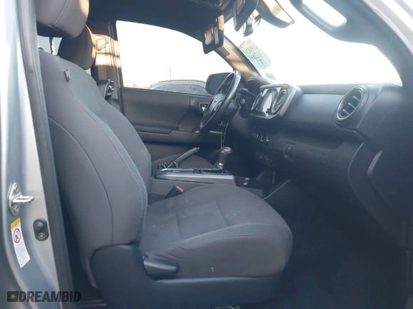 2018 Toyota Tacoma SR with VIN 3TMCZ5AN1JM141605, listed as a IAAI auction lot 41558201 with 91,855 mi miles. Bid and sale history available at carsss.com. Image 5.