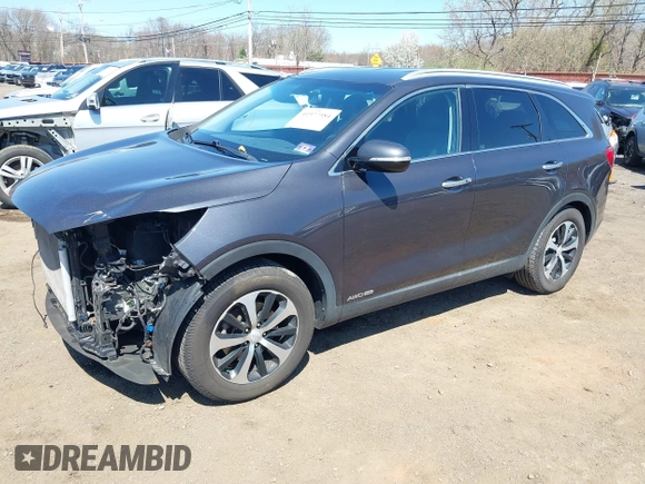 2018 Kia Sorento EX with VIN 5XYPHDA57JG388378, listed as a IAAI auction lot 41977584 with 121,482 mi miles and . Bid and sale history available at carsss.com. Image 2.