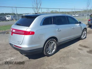 2015 Lincoln MKT EcoBoost with VIN 2LMHJ5AT4FBL00959, listed as a IAAI auction lot 41991763 with 159,687 mi miles and . Bid and sale history available at DreamBid. Image 4.