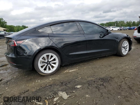2023 Tesla Model 3 with VIN 5YJ3E1EA3PF451764, listed as a Copart auction lot 58718705 with 33,965 mi miles and Salvage title. Bid and sale history available at DreamBid. Image 3.