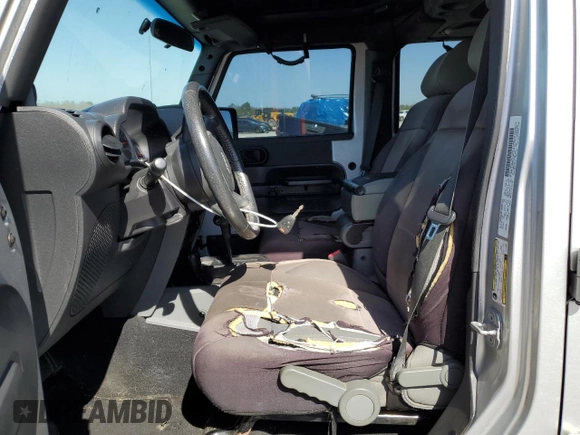 2010 Jeep Wrangler Unlimited Rubicon with VIN 1J4BA6H12AL107485, listed as a Copart auction lot 48802825 with 123,299 mi miles and Salvage title. Bid and sale history available at DreamBid. Image 7.