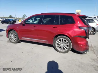 2020 Cadillac XT6 AWD Sport with VIN 1GYKPGRS0LZ105732, listed as a Copart auction lot 49394255 with 57,871 mi miles and Salvage Title. Bid and sale history available at carsss.com. Image 2.