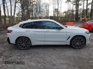 2023 BMW X4 M40i with VIN 5UX43DT02P9T17357, listed as a IAAI auction lot 41683916 with 25,954 mi miles and . Bid and sale history available at DreamBid. Image 12.